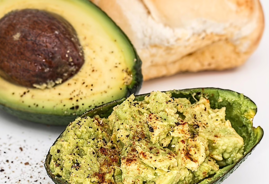 Stuffed avocado filled with homemade guacamole, fresh and simple mexican food often found during trips across Mexico
