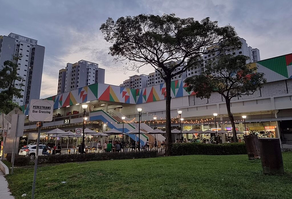 Exterior view of 51 Old Airport Road Food Centre, a popular food hub in Singapore, offering local street food and a vibrant atmosphere. Singapore Cuisine