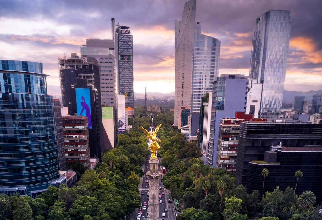 Mexico City skyline along Paseo de la Reforma with the Angel of Independence, a safe and vibrant area for travelers visiting Mexico