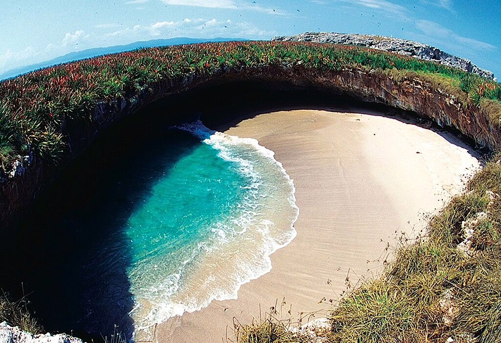 Aerial view of Hidden Beach at Marietas Islands near Puerto Vallarta, a protected beach inside a volcanic crater