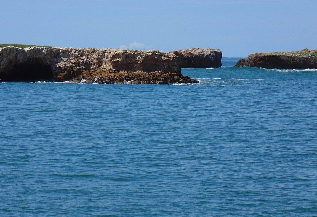 Marietas Islands seen from the ocean near Puerto Vallarta, showing volcanic rock formations in the Pacific Ocean