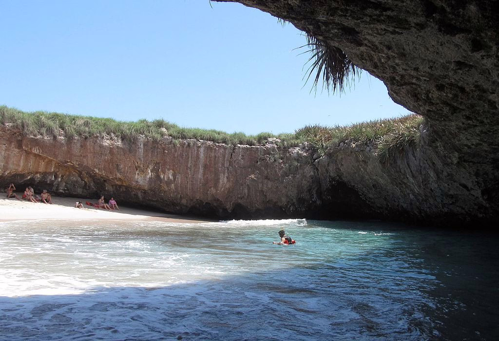 Hidden Beach at Marietas Islands near Puerto Vallarta, a protected natural beach accessed by swimming through a volcanic tunnel