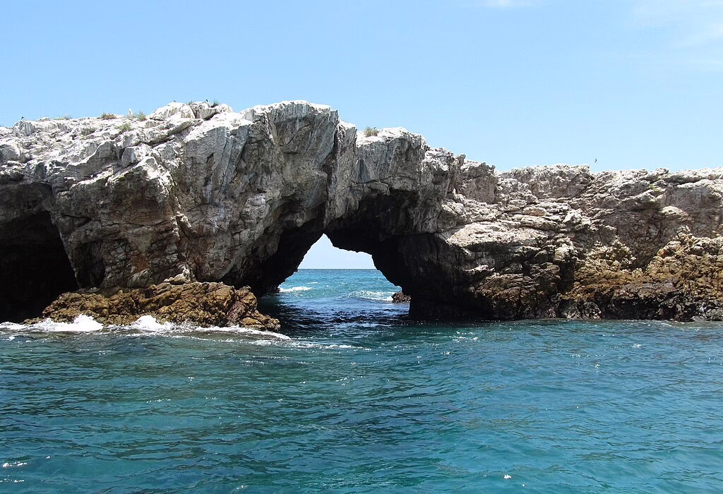 Volcanic sea arch and cave at Marietas Island near Puerto Vallarta, part of the protected Marietas Islands National Park
